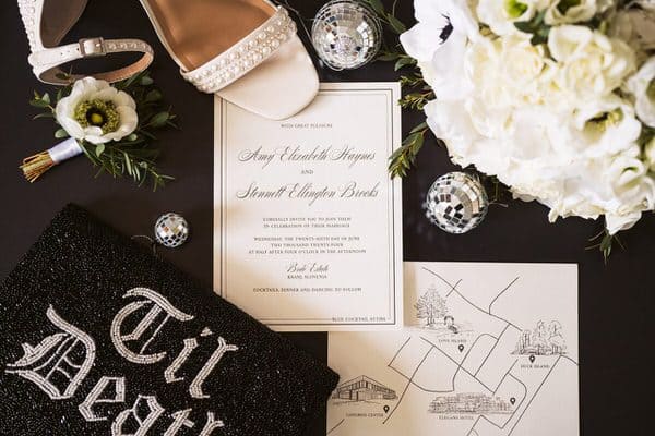 invitation letter and small wedding detail of american couple that is getting married on their destination wedding in slovenia